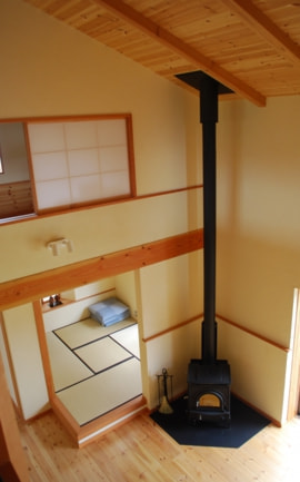中村建築事務所の住まいの建築例 薪ストーブのあるリビング